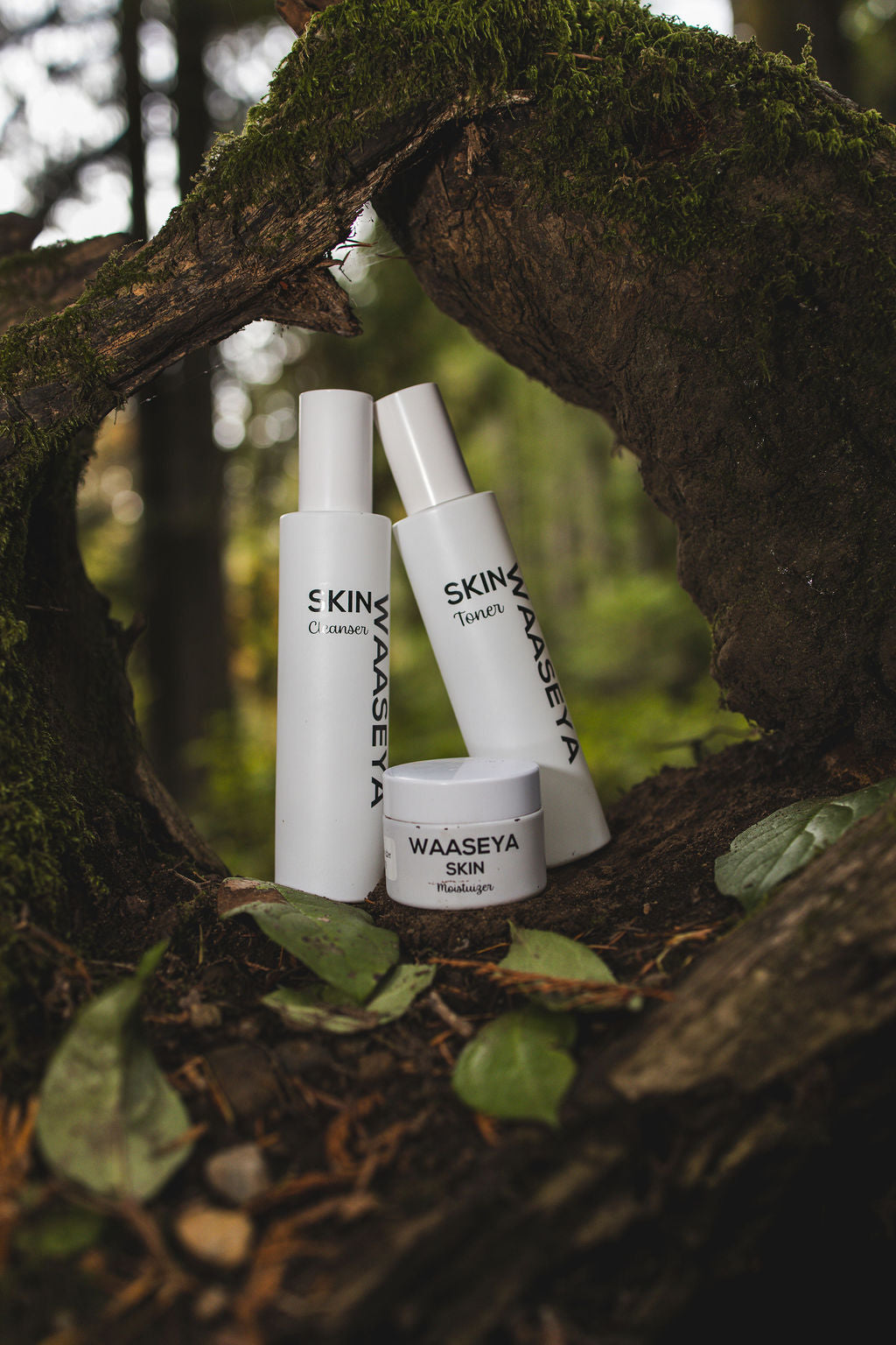Natural Skincare products with 'WAASEYA' branding in a natural setting.
